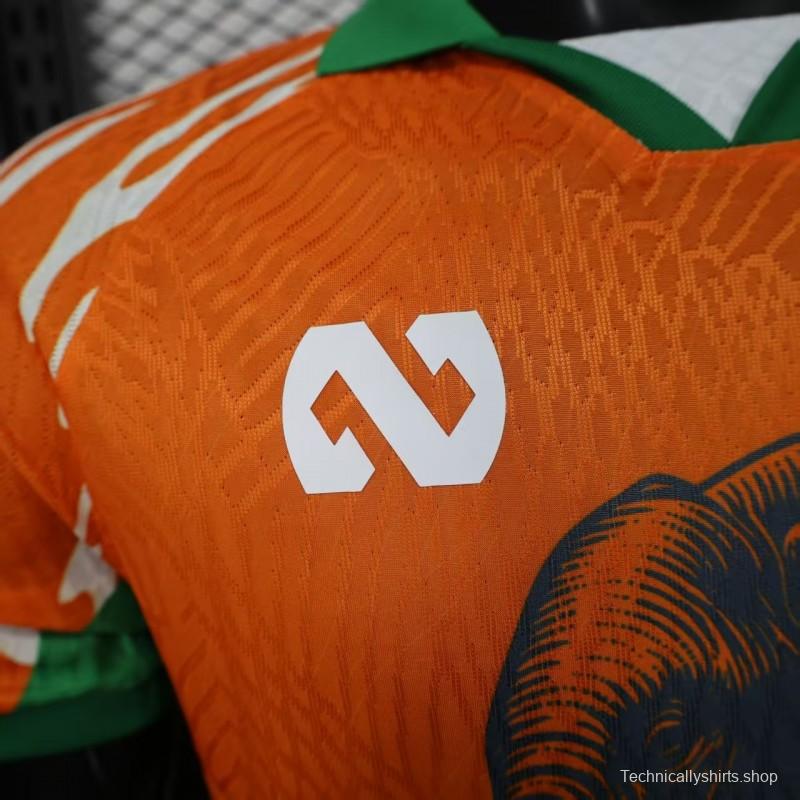 Player Version 2025 Ivory Coast Orange with Elephant Graphic and Green Accents Jersey